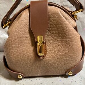Chic Tan Leather Hand or Shoulder Bag with Gold tone Accents & crossbody strap